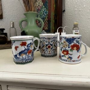 Three Takakashi coffee mugs cups